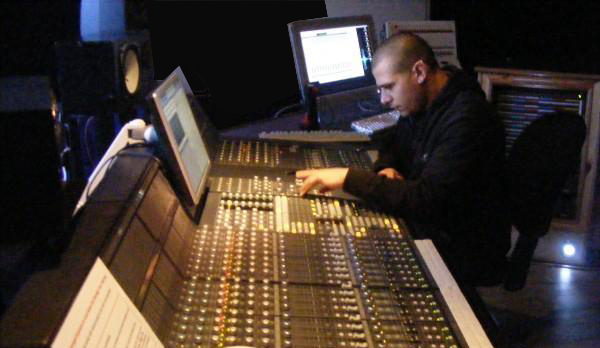 Memz sitting at the SSL G Series mixing console